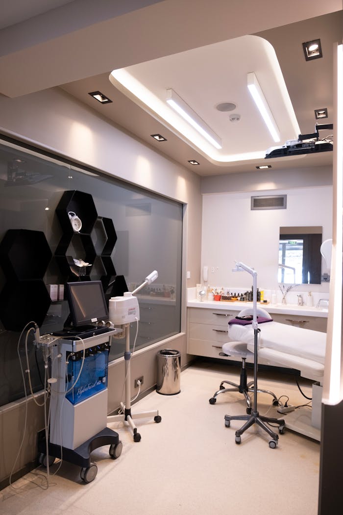 Contemporary beauty clinic with advanced medical equipment and clean design.